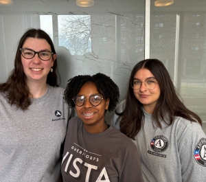 Photo of 3 people in AmeriCorps t-shirts