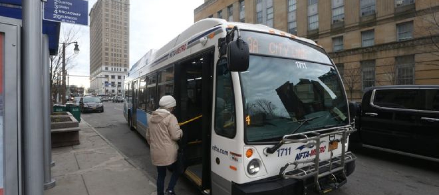 person going on a bus